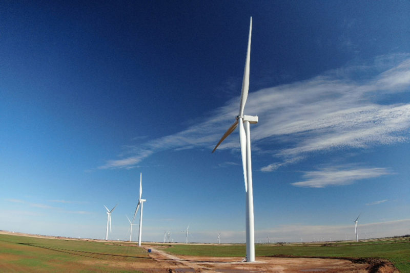 wind turbines in open field